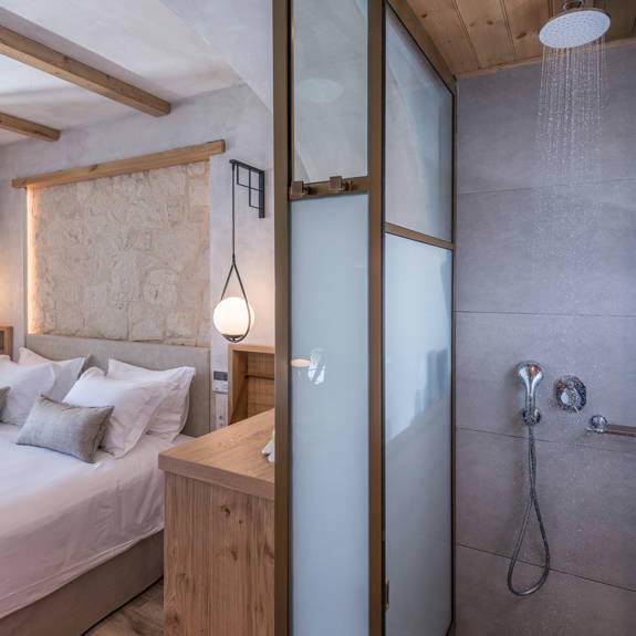 Double room bed and shower