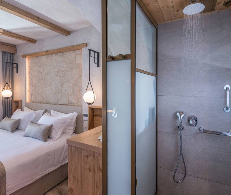 Double room bed and shower
