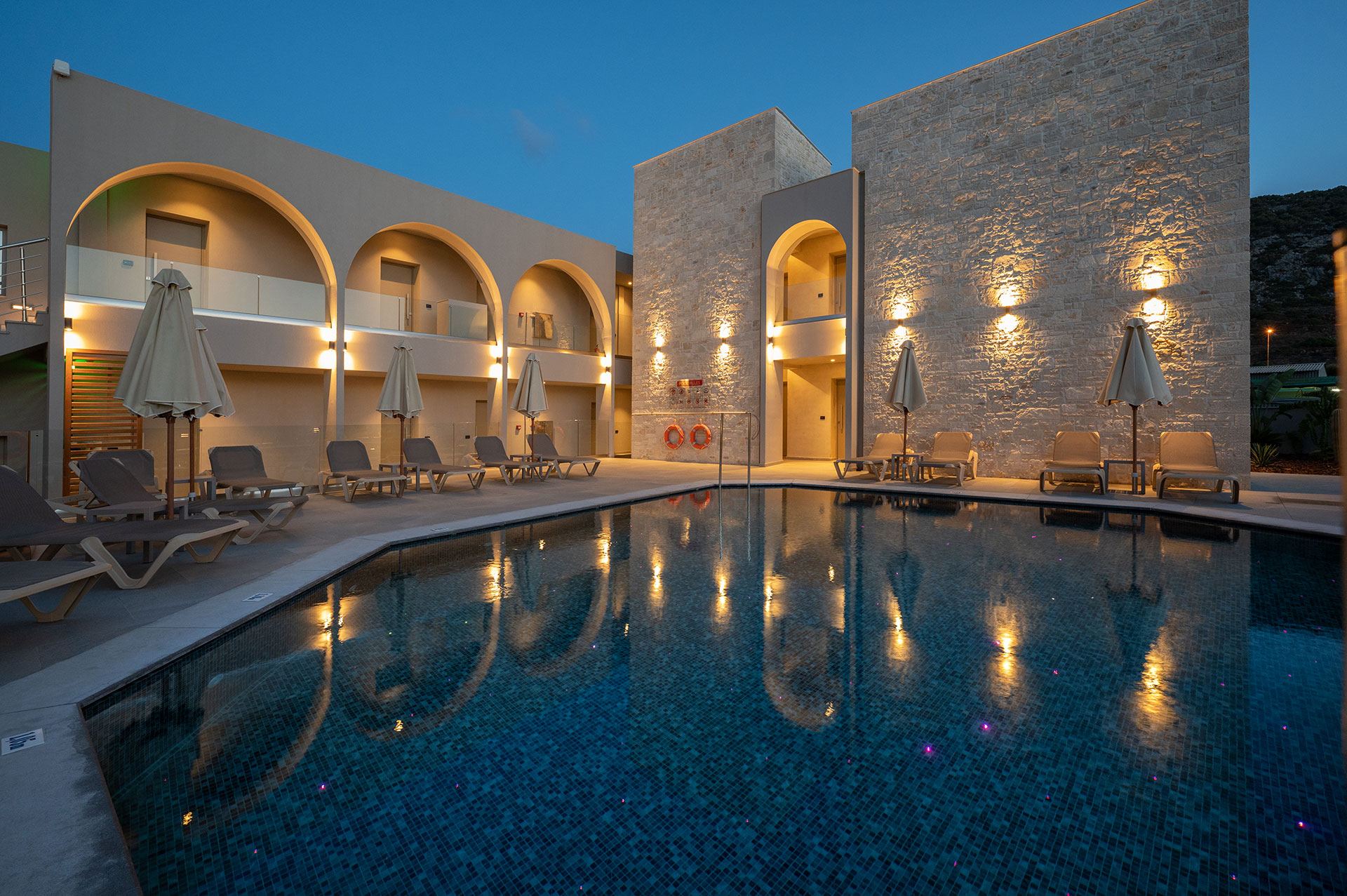 Annex pool bar lit up at night time